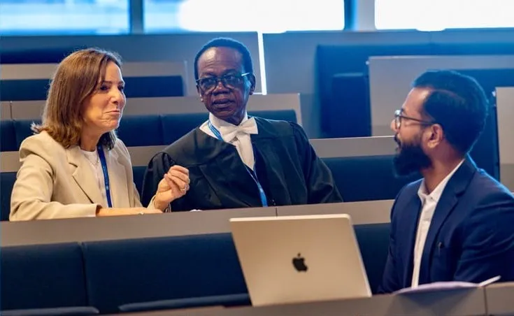 Judges in conversation between rounds at the IBA ICC Moot Court Competition 2026