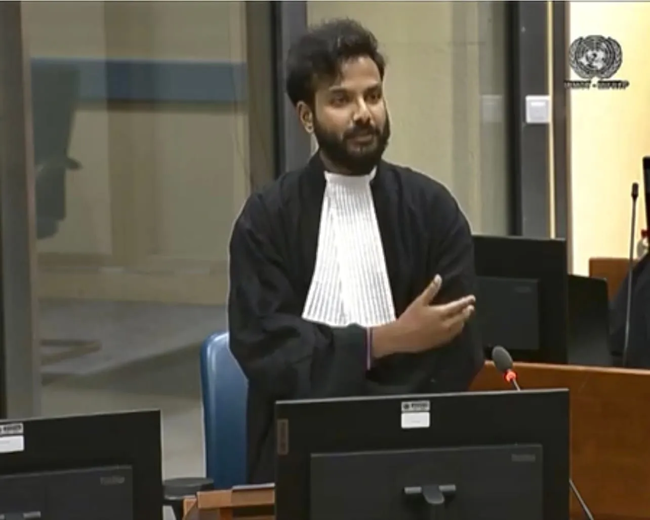 Farhaan Ahmed, in advocate's robes, making submissions at the counsel bench during the 2023 Mock Trial and Training at the IRMCT, The Hague